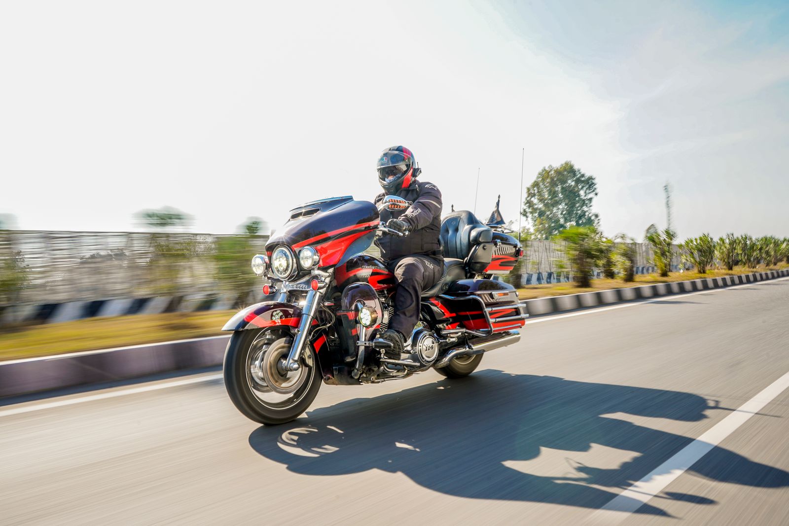 Rider on a touring motorcycle on an open road