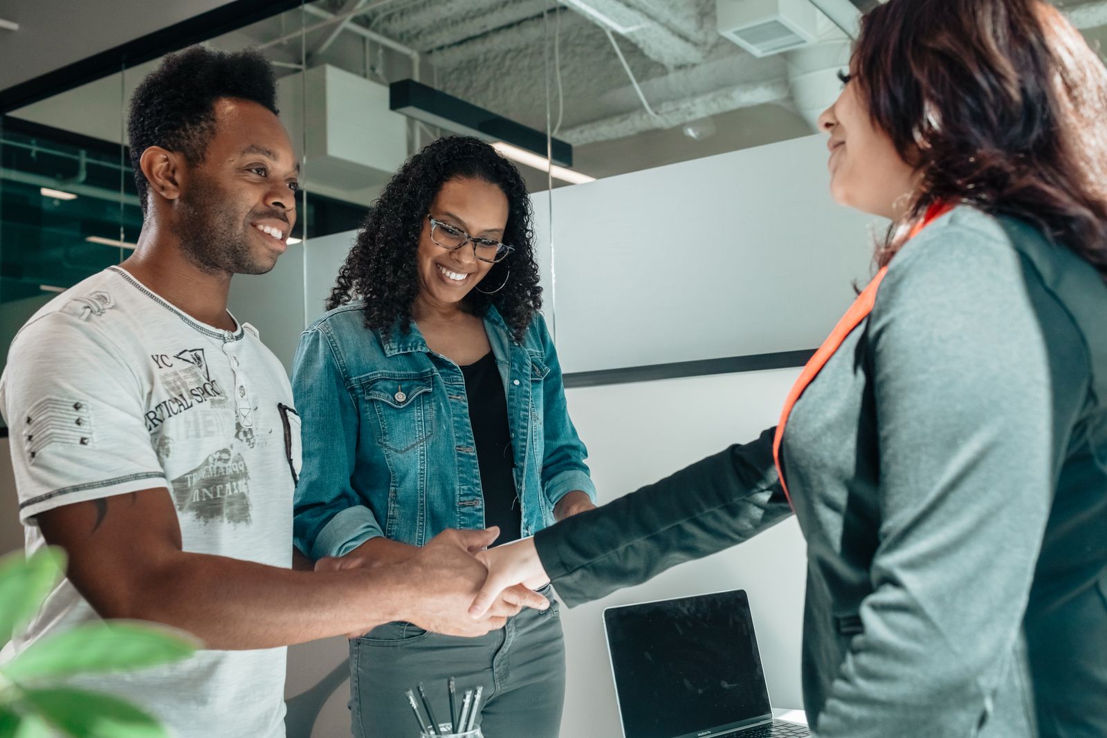 Couple meeting with a friendly advisor