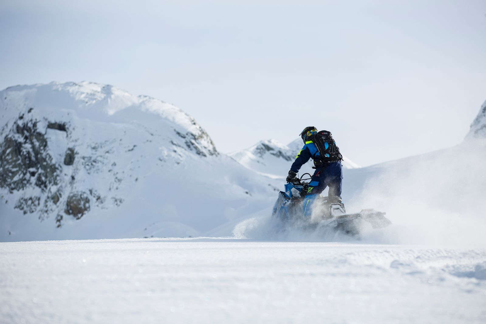 Rider on a snowmobile in fresh snow